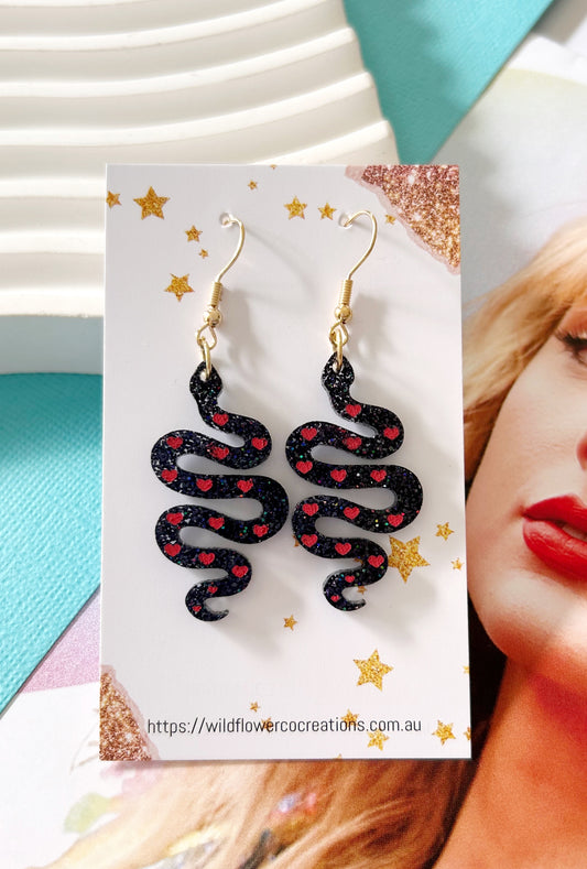 Reputation snake hook Statement dangles